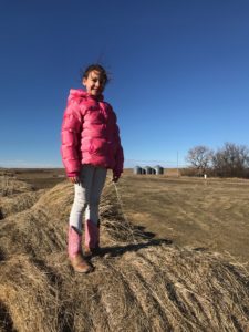 In a day and age when technology doesn�t give kids an opportunity to experience boredom, a stack of cattle feed captured and held Parker's attention for hours.